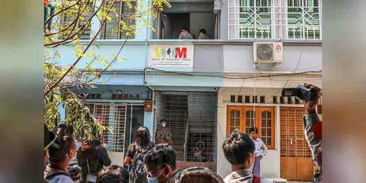 Police conduct a search of the Voice of Myanmar office on March 31. / Zaw Zaw / The Irrawaddy