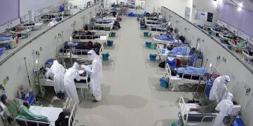 COVID-19 patients are treated at a temporary hospital at Yangon’s Thuwunna Football Stadium. / U Zaw Zaw's Facebook page