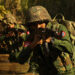 An Arakan Army soldier patrols in northern Rakhine State.  / Arakan Army