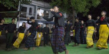 Peacock Generation members chant satirical verses during a performance in Yangon on the last day of the 2019 Thingyan water festival. / Htet Wai / The Irrawaddy