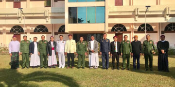 Representatives from the Myanmar military and Kachin religious organizations pose for a group photo at the military’s Northern Command compound on Monday. / Kachin Baptist Convention / Facebook