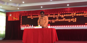 Mandalay regional Chief Minister U Zaw Myint Maung gives a speech at the meeting in Mandalay on Friday. / The Irrawaddy