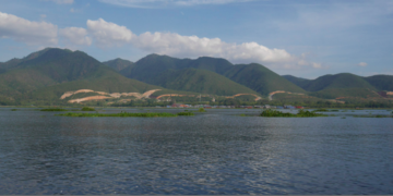 Land being cleared to make way for a hotel zone is visible on the hillside above Inle Lake in December 2016. / Tin Htet Paing / The Irrawaddy