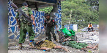 Myanmar security forces remove the bodies of those killed when a police outpost in Naung Cho, northern Shan State, was attacked by Northern Alliance Forces in August 2019. / MPA