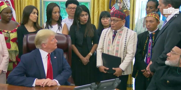US President Donald Trump listens to the Rev. Dr. Hkalam Samson speak about ethnic and religious issues in Myanmar at the White House on July 17, 2019. / White House video screenshot