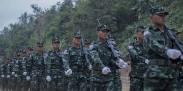 Members of the Karen National Liberation Army, the armed wing of the KNU, march to mark the 69th anniversary of Armed Forces Day in Karen State in February. / Aung Aung Kyaw / Facebook