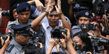 Reuters reporter Ko Kyaw Soe Oo is seen outside the court in Yangon’s Insein Township after he and his colleague Ko Wa Lone were convicted of violating the Official Secrets Act on Sept 3. / Myo Min Soe / The Irrawaddy