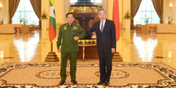 Myanmar military chief Snr-Gen Min Aung Hlaing and Chinese Foreign Minister Wang Yi meet in Naypyitaw on Tuesday. / Tatmadaw Information Team