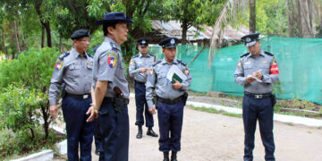 Chief of Mon State Police Force Police Col. Bo Bo Oo inspecting police stations in Mawlamyine. / Mon State Police Force
