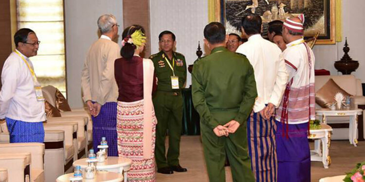 Myanmar Army chief Snr-Gen Min Aung Hlaing (center) with President U Htin Kyaw, State Counselor Daw Aung San Suu Kyi, vice presidents and house speakers on Oct. 15, the day marking the second anniversary of the signing of Nationwide Ceasefire Agreement. / Snr-Gen Min Aung Hlaing / Facebook