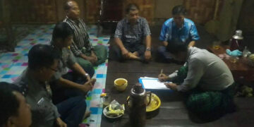 New Mon State Party members hand Akyin over to police. / Aung Naing Win