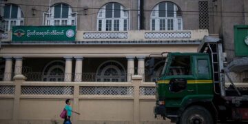 Military-owned Myawaddy Trading and Bank Limited building in Yangon on Strand Road. / The Irrawaddy