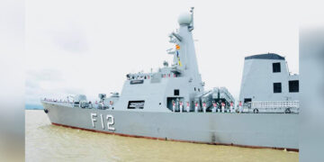 Naval officers wave from the Kyan Sitt Thar warship to their senior commanders as they leave Yangon in a photo posted by the Myanmar navy to Facebook on Monday, August 26, 2019. / Myanmar navy / Facebook