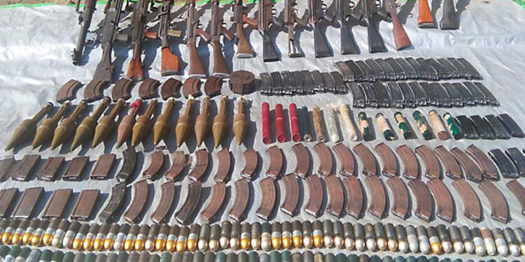 Weapons and ammunition seized from Assam and Manipur rebel outposts near Taga in Sagaing Region’s Naga Self-administered Zone are displayed by the Tatmadaw. / Office of the Commander-in-Chief of Defense Services
