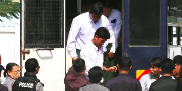 The defendants in U Phyo Ko Ko Tint San’s drugs and weapons trial appear at Dekkhinathiri District Court in Naypyitaw in January 2018. / The Irrawaddy