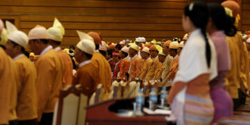 Lawmakers attend a meeting in the Lower House of Myanmar's Parliament in Naypyitaw on March 10, 2016. / Reuters