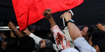 Supporters carry the coffin of Ko Ni on Jan. 30, a prominent member of Burma’s Muslim minority and legal adviser for the ruling National League for Democracy, after he was shot dead, in Rangoon the previous day. / Soe Zeya Tun / Reuters
