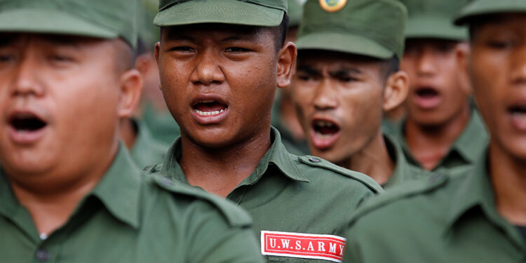 United Wa State Army (UWSA) soldiers march during a media display in Panghsang, Wa Special Region 2  in northeast Myanmar on October 4, 2016. / Reuters
