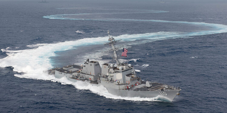The guided-missile destroyer USS William P. Lawrence, seen here practicing ship maneuvers on June 23, 2018, has been running drills with Japan in the Asia-Pacific this past week, in moves largely seen as countering regional Chinese power. / Mass Communication Specialist 2nd Class Jessica O. Blackwell via Reuters