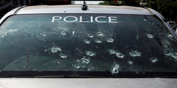 Bullet holes riddle the window of a police car after a Thai soldier went on a deadly shooting rampage in Nakhon Ratchasima, Thailand, on Feb. 9, 2020. / REUTERS