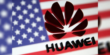 A 3D printed Huawei logo is placed on glass above a US flag in this illustration created in January 2019. / REUTERS