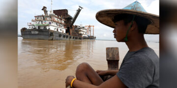 The Star Optimus, a dredger vessel that belongs to Starhigh Asia Pacific, sits docked on the Salween River in Mawlamyine, Mon State on Sept. 18, 2019. / REUTERS