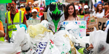 An environmental activist dressed in a costume made with plastic bags participates in a Global Climate Strike event near the Ministry of Natural Resources and Environment in Bangkok, Thailand on Sept. 20, 2019. / REUTERS