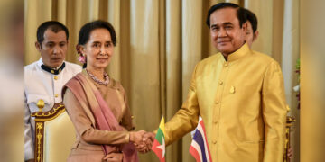 Myanmar State Counselor Daw Aung San Suu Kyi and Thai Prime Minister Prayut Chan-o-cha pose for a photo after a meeting in Bangkok, Thailand in June 2016. / The Irrawaddy