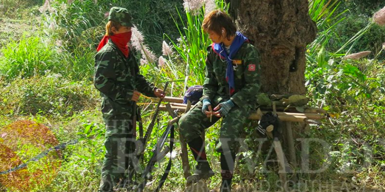 Two members of the KNPP man a checkpoint in the Shadaw area of Loikaw Township. / Kyaw Kha / The Irrawaddy