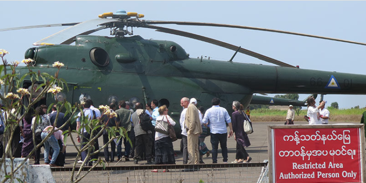A UN Security Council delegation prepares to fly to Maungdaw from Sittwe airport in Rakhine State on May 1. / Min Aung Khaing / The Irrawaddy
