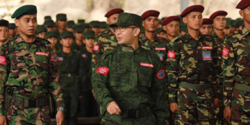 Arakan Army chief Tun Myat Naing attends a cadet graduation ceremony in Kachin’s Laiza Township, where the armed group’s headquarters is situated.  / Arakan Army Info Desk