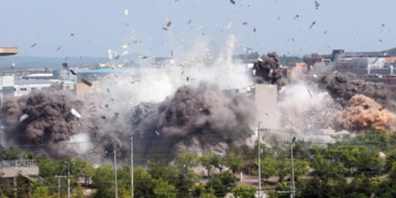 North Korean personnel blow up the inter-Korean liaison office in Kaesong, North Korea on June 16, 2020. / KCNA / Kyodo