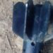 One of the shells which hit the village of Puwang in Muse Township on Saturday. / W.P. Moses