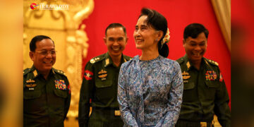 State Counselor Daw Aung San Suu Kyi and three military-appointed ministers share a laugh in Naypyitaw on March 30, 2016. / The Irrawaddy
