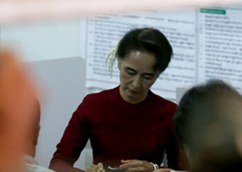 State Counselor Daw Aung San Suu Kyi casts her vote in Bahan Township, Yangon, during the November 2015 general election. / The Irrawaddy