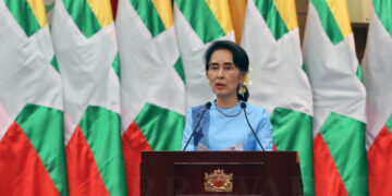 State Counselor Daw Aung San Suu Kyi addresses businesses leaders in Naypyidaw on Saturday. / JPaing / The Irrawaddy