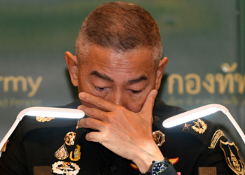 Thai army chief Apirat Kongsompong reacts during a news conference in Bangkok following last weekend's shooting rampage by a soldier at a mall in the city of Nakhon Ratchasima, on Feb. 11, 2020. / Reuters
