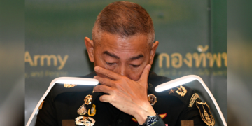Thai army chief Apirat Kongsompong reacts during a news conference in Bangkok following last weekend's shooting rampage by a soldier at a mall in the city of Nakhon Ratchasima, on Feb. 11, 2020. / Reuters
