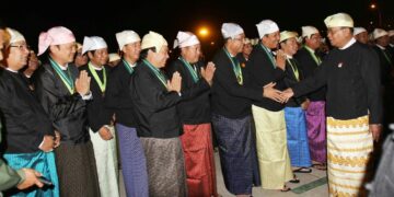 From left to right: U Khin Shwe,U Tay Za, U Nay Aung, Steven Law, U Win Aung, U Aung Ko Win, U Chit Khine,U Zaw Zaw,U Htay Myint and U Tint Hsan shake hands with Snr-Gen Than Shwe, prior to 2011. / Khin Maung Win / Shwe Inn Thar