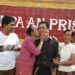 Burmese blogger Nay Phone Latt's grandmother (2nd L) kisses him as he reunites with his mother (R) and elder brother (L) in front of Pa-an prison, in Pa-an January 13, 2012. / Soe Zeya Tun / Reuters