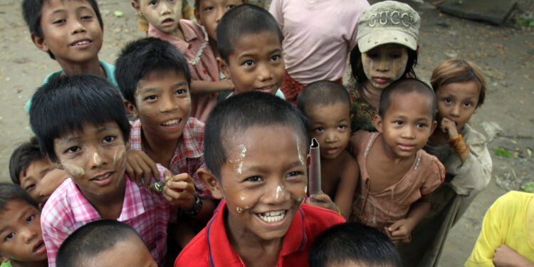 Children react to visitors in a village in Nyaung Tone, Irrawaddy Delta, about 60 miles southwest of Yangon, Myanmar. / The Irrawaddy