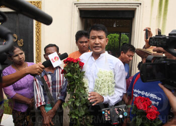 Former child solider Ko Aung Ko Htwe talks to the media upon his release on Friday from Yangon's Insein Prison. / Myo Min Soe / The Irrawaddy