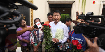 Former child solider Ko Aung Ko Htwe talks to the media upon his release on Friday from Yangon's Insein Prison. / Myo Min Soe / The Irrawaddy