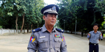 Police Maj-Gen Thura San Lwin talks to the media in Kyee Kan Pyin village outside Maungdaw, Oct. 26, 2016. / Reuters