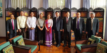 Myanmar State Counselor Daw Aung San Suu Kyi and officials from China Railway Eryuan Engineering Group and Shwe Yadanar Aung Co. Ltd. pose for a group photo on June 11, 2019. / Daw Khin Kyi Foundation