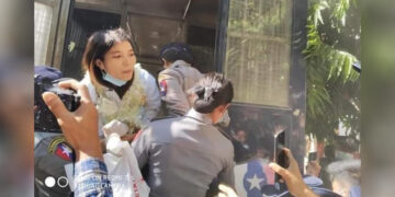 Ma Thinzar Than Min, 25, outside of the Pakokku Township Court. / Facebook