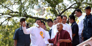 Snr-Gen Min Aung Hlaing (left, front) with U Kovida (right, front) during the Hti Umbrella placing ceremony at ancient Htilominlo Temple in Bagan in 2020. (The Irrawaddy)