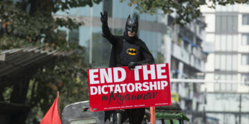 An anti-military regime protester wears a Batman outfit in Yangon on Feb. 15. / The Irrawaddy
