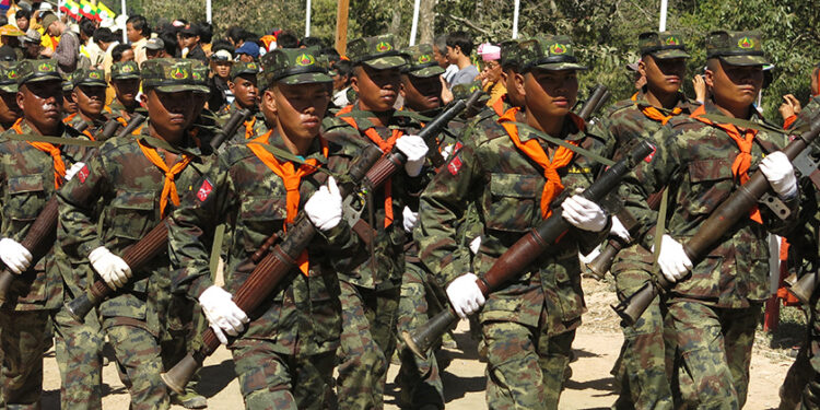 RCSS/SSA-S fighters participate in a military parade in Shan State in 2018. / Kyaw Kha / The Irrawaddy