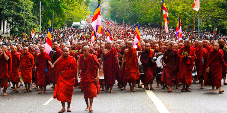 Buddhist monks march during the Saffron Revolution in Yangon in September 2007. / Khin Maung Win